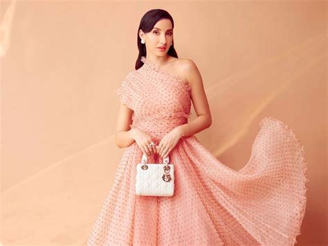 The Real Costs Of Nora Fatehi’s Luxury Handbags 